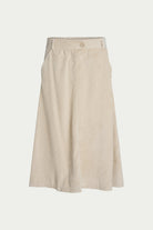 A light beige wide-leg skirt with a button closure at the waistband, displayed against a solid off-white background.